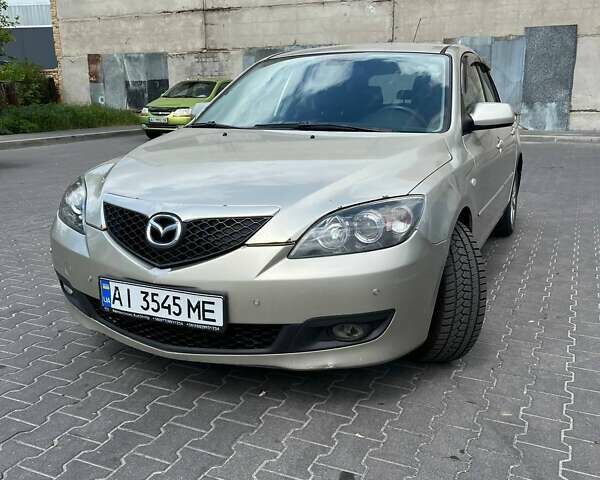 Бежевий Мазда 3, об'ємом двигуна 1.6 л та пробігом 243 тис. км за 5100 $, фото 1 на Automoto.ua