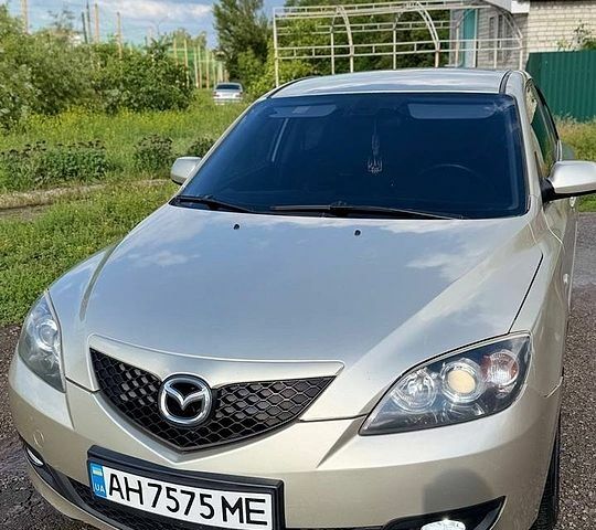 Бежевый Мазда 3, объемом двигателя 1.6 л и пробегом 300 тыс. км за 5300 $, фото 1 на Automoto.ua