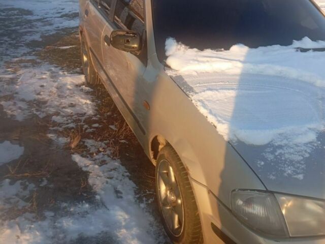 Бежевый Мазда 3, объемом двигателя 2 л и пробегом 325 тыс. км за 255 $, фото 1 на Automoto.ua