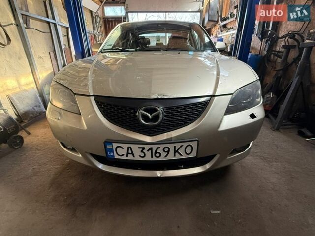 Бежевий Мазда 3, об'ємом двигуна 1.6 л та пробігом 257 тис. км за 3500 $, фото 1 на Automoto.ua