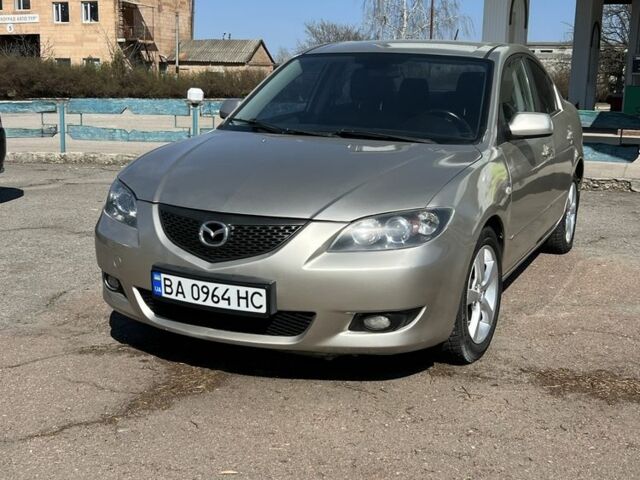 Бежевый Мазда 3, объемом двигателя 1.6 л и пробегом 191 тыс. км за 4500 $, фото 1 на Automoto.ua