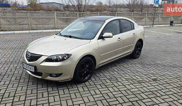 Бежевый Мазда 3, объемом двигателя 1.6 л и пробегом 236 тыс. км за 4900 $, фото 1 на Automoto.ua