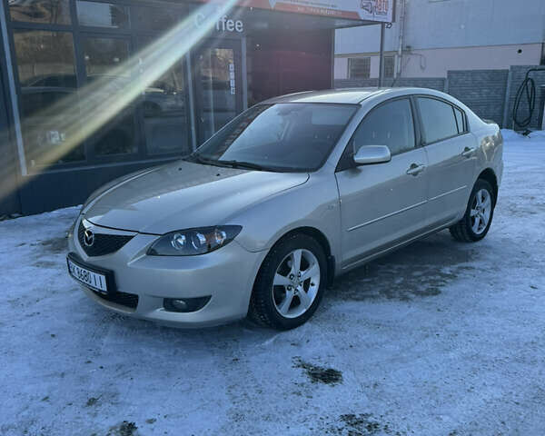 Бежевий Мазда 3, об'ємом двигуна 1.6 л та пробігом 251 тис. км за 5450 $, фото 1 на Automoto.ua
