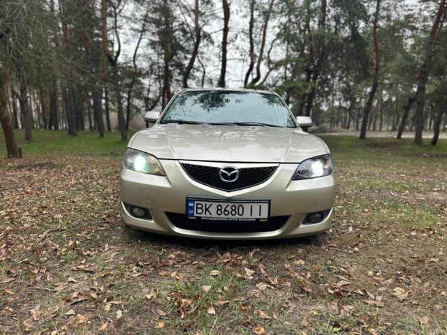 Бежевый Мазда 3, объемом двигателя 1.6 л и пробегом 252 тыс. км за 4000 $, фото 1 на Automoto.ua