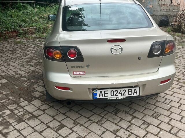 Бежевий Мазда 3, об'ємом двигуна 1.6 л та пробігом 438 тис. км за 4000 $, фото 1 на Automoto.ua