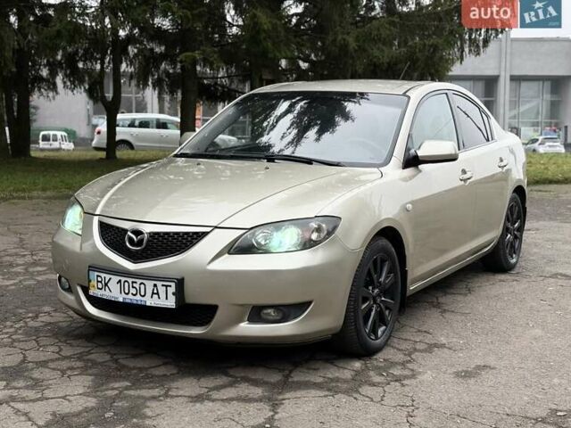 Бежевый Мазда 3, объемом двигателя 1.6 л и пробегом 220 тыс. км за 3499 $, фото 1 на Automoto.ua