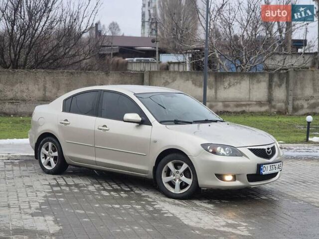 Бежевый Мазда 3, объемом двигателя 1.6 л и пробегом 195 тыс. км за 5900 $, фото 1 на Automoto.ua