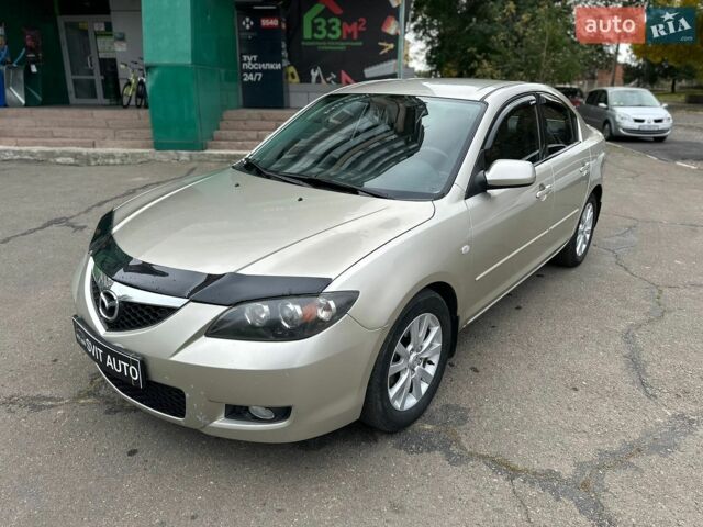 Бежевий Мазда 3, об'ємом двигуна 2 л та пробігом 189 тис. км за 5600 $, фото 1 на Automoto.ua