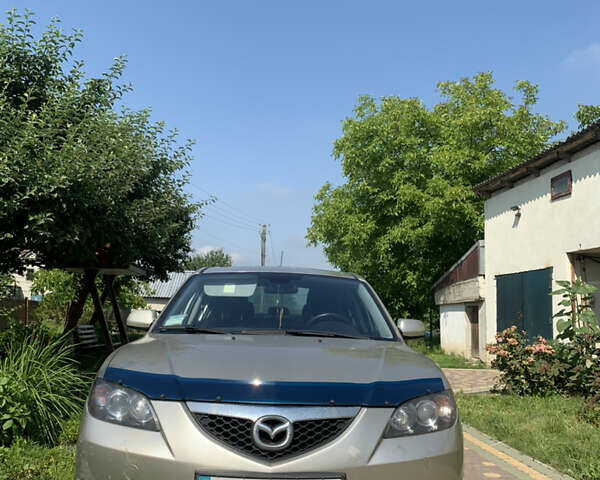 Бежевый Мазда 3, объемом двигателя 1.6 л и пробегом 154 тыс. км за 6200 $, фото 1 на Automoto.ua