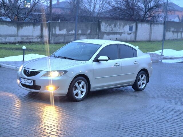 Бежевый Мазда 3, объемом двигателя 1.6 л и пробегом 195 тыс. км за 5999 $, фото 1 на Automoto.ua