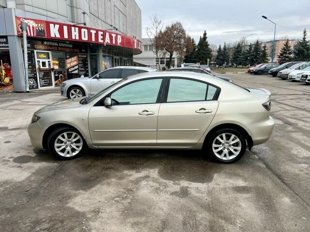 Бежевый Мазда 3, объемом двигателя 2 л и пробегом 246 тыс. км за 5799 $, фото 1 на Automoto.ua