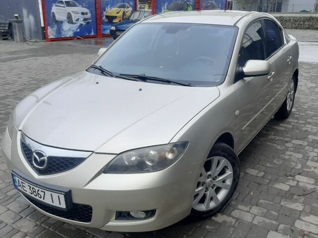 Бежевый Мазда 3, объемом двигателя 1.6 л и пробегом 236 тыс. км за 5595 $, фото 1 на Automoto.ua