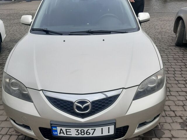 Бежевый Мазда 3, объемом двигателя 1.6 л и пробегом 226 тыс. км за 5900 $, фото 1 на Automoto.ua