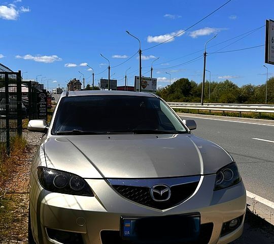 Бежевый Мазда 3, объемом двигателя 0.2 л и пробегом 198 тыс. км за 5000 $, фото 1 на Automoto.ua