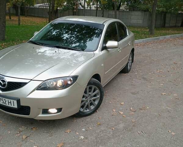 Бежевий Мазда 3, об'ємом двигуна 1.6 л та пробігом 223 тис. км за 5400 $, фото 1 на Automoto.ua