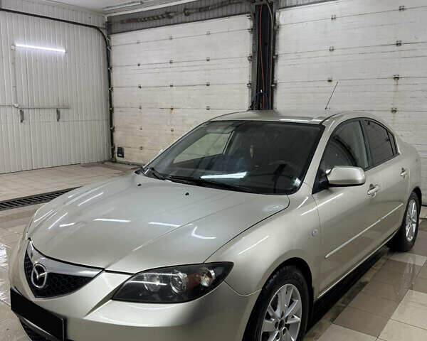 Бежевий Мазда 3, об'ємом двигуна 1.6 л та пробігом 247 тис. км за 5600 $, фото 1 на Automoto.ua