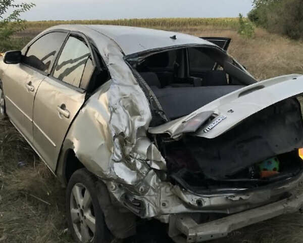 Бежевый Мазда 3, объемом двигателя 1.6 л и пробегом 222 тыс. км за 1500 $, фото 1 на Automoto.ua