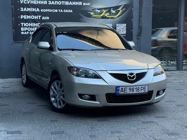 Бежевый Мазда 3, объемом двигателя 1.6 л и пробегом 220 тыс. км за 5300 $, фото 1 на Automoto.ua