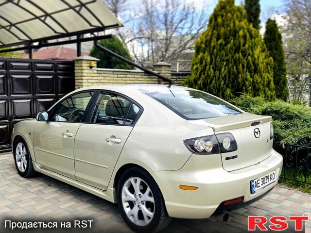 Бежевый Мазда 3, объемом двигателя 2 л и пробегом 180 тыс. км за 4750 $, фото 1 на Automoto.ua