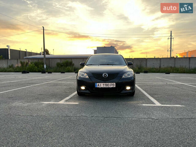 Черный Мазда 3, объемом двигателя 2 л и пробегом 215 тыс. км за 4050 $, фото 1 на Automoto.ua