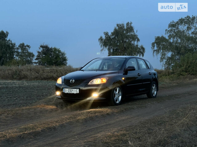 Чорний Мазда 3, об'ємом двигуна 1.6 л та пробігом 169 тис. км за 4150 $, фото 1 на Automoto.ua