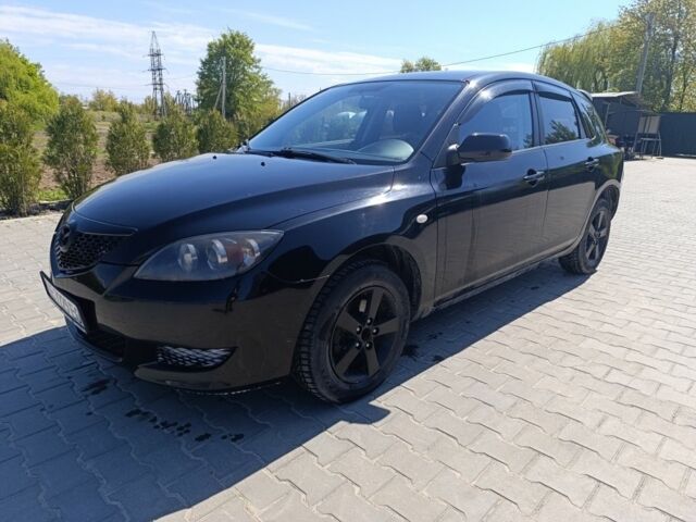 Черный Мазда 3, объемом двигателя 1.6 л и пробегом 327 тыс. км за 4000 $, фото 1 на Automoto.ua