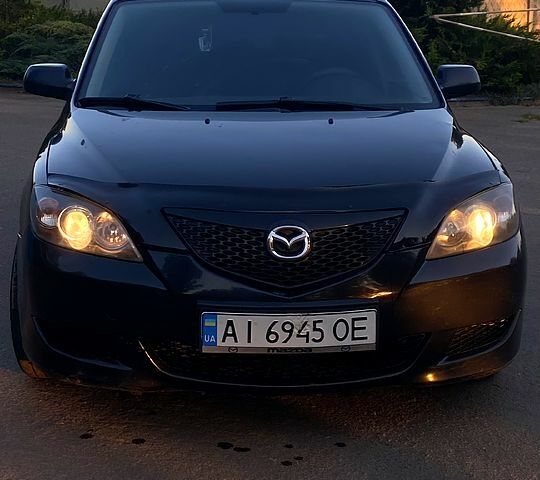 Чорний Мазда 3, об'ємом двигуна 1.6 л та пробігом 237 тис. км за 4100 $, фото 1 на Automoto.ua
