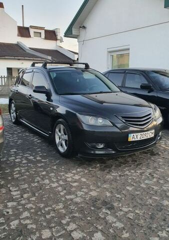 Черный Мазда 3, объемом двигателя 1.6 л и пробегом 205 тыс. км за 3000 $, фото 1 на Automoto.ua