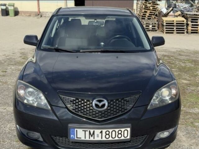 Черный Мазда 3, объемом двигателя 1.6 л и пробегом 250 тыс. км за 1300 $, фото 1 на Automoto.ua
