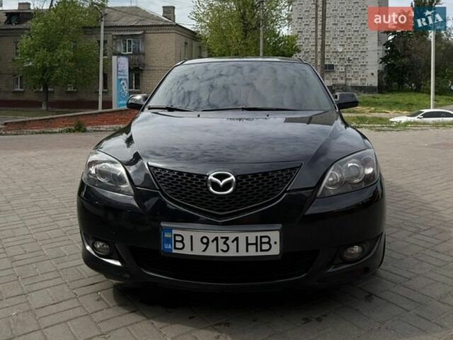 Черный Мазда 3, объемом двигателя 1.6 л и пробегом 223 тыс. км за 4800 $, фото 1 на Automoto.ua