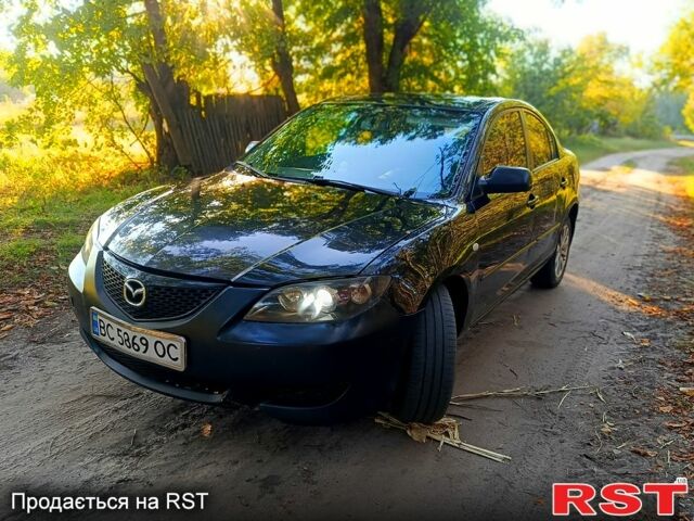 Черный Мазда 3, объемом двигателя 1.6 л и пробегом 124 тыс. км за 2950 $, фото 1 на Automoto.ua