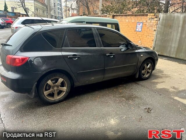 Чорний Мазда 3, об'ємом двигуна 1.6 л та пробігом 246 тис. км за 3500 $, фото 1 на Automoto.ua