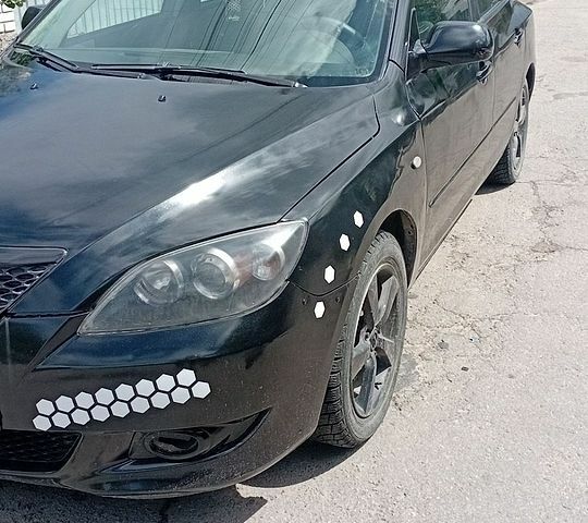 Чорний Мазда 3, об'ємом двигуна 1.56 л та пробігом 200 тис. км за 3000 $, фото 1 на Automoto.ua