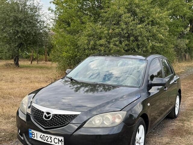 Черный Мазда 3, объемом двигателя 2 л и пробегом 272 тыс. км за 3500 $, фото 1 на Automoto.ua