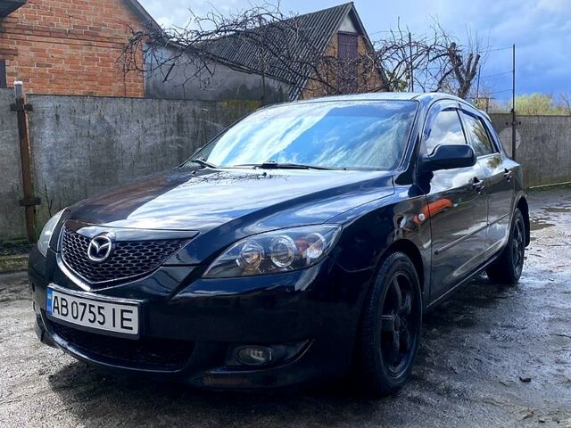 Черный Мазда 3, объемом двигателя 1.6 л и пробегом 260 тыс. км за 3650 $, фото 1 на Automoto.ua