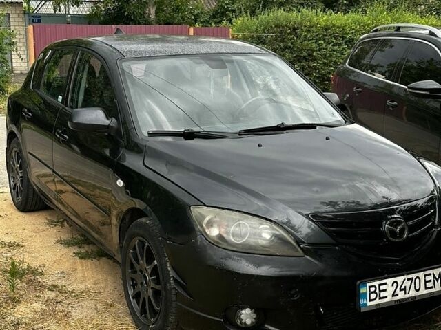 Черный Мазда 3, объемом двигателя 2 л и пробегом 413 тыс. км за 2500 $, фото 1 на Automoto.ua