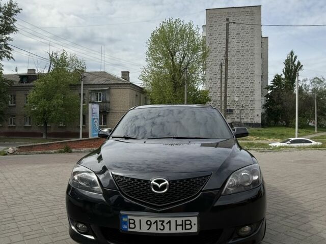 Черный Мазда 3, объемом двигателя 1.6 л и пробегом 223 тыс. км за 4199 $, фото 1 на Automoto.ua