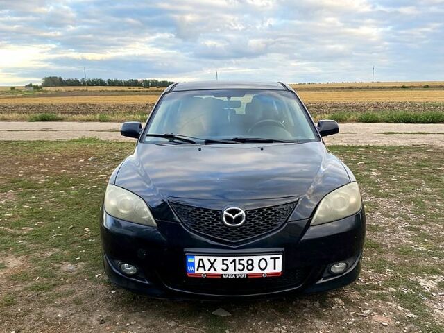 Черный Мазда 3, объемом двигателя 1.6 л и пробегом 343 тыс. км за 3700 $, фото 1 на Automoto.ua