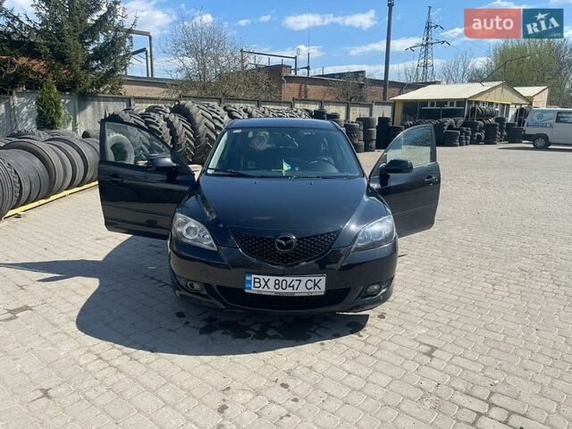 Черный Мазда 3, объемом двигателя 1.6 л и пробегом 245 тыс. км за 4700 $, фото 1 на Automoto.ua