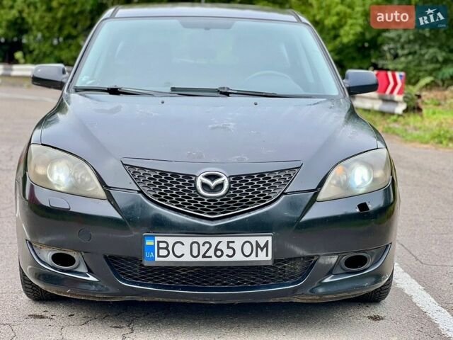 Чорний Мазда 3, об'ємом двигуна 1.6 л та пробігом 260 тис. км за 2499 $, фото 1 на Automoto.ua