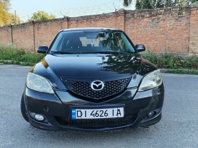 Чорний Мазда 3, об'ємом двигуна 1.6 л та пробігом 333 тис. км за 2598 $, фото 1 на Automoto.ua