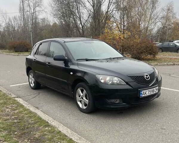 Черный Мазда 3, объемом двигателя 1.6 л и пробегом 230 тыс. км за 2650 $, фото 1 на Automoto.ua