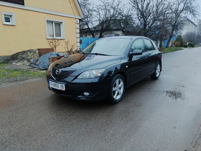 Чорний Мазда 3, об'ємом двигуна 1.6 л та пробігом 242 тис. км за 4250 $, фото 1 на Automoto.ua