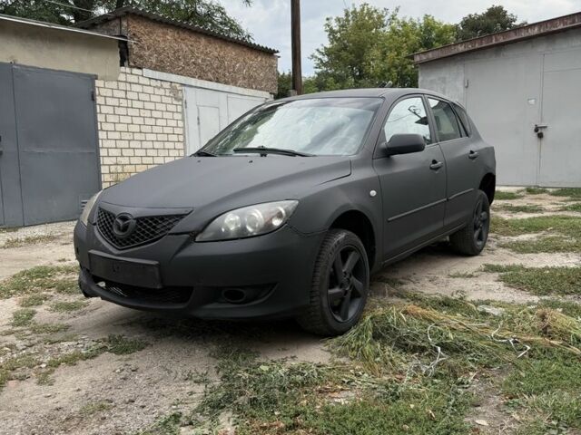 Чорний Мазда 3, об'ємом двигуна 1.6 л та пробігом 300 тис. км за 1398 $, фото 1 на Automoto.ua