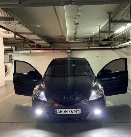 Черный Мазда 3, объемом двигателя 1.6 л и пробегом 250 тыс. км за 4000 $, фото 1 на Automoto.ua