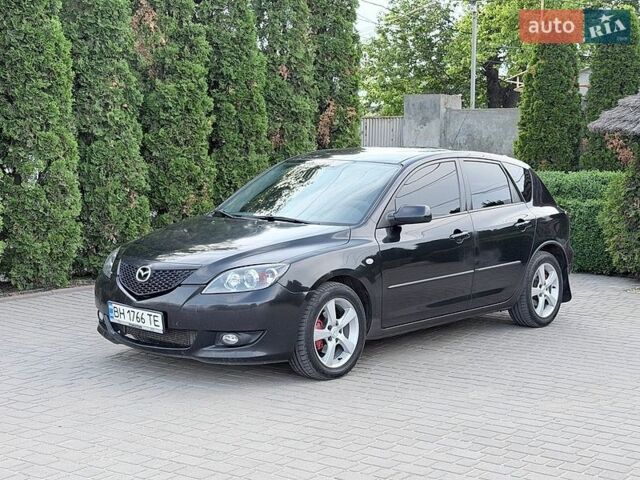 Черный Мазда 3, объемом двигателя 1.6 л и пробегом 299 тыс. км за 3800 $, фото 1 на Automoto.ua