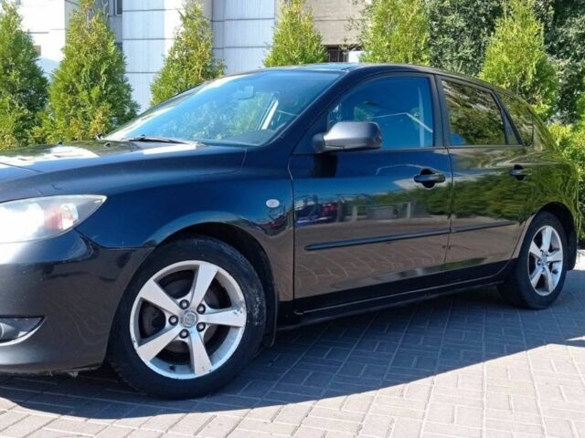Черный Мазда 3, объемом двигателя 1.6 л и пробегом 290 тыс. км за 3500 $, фото 1 на Automoto.ua