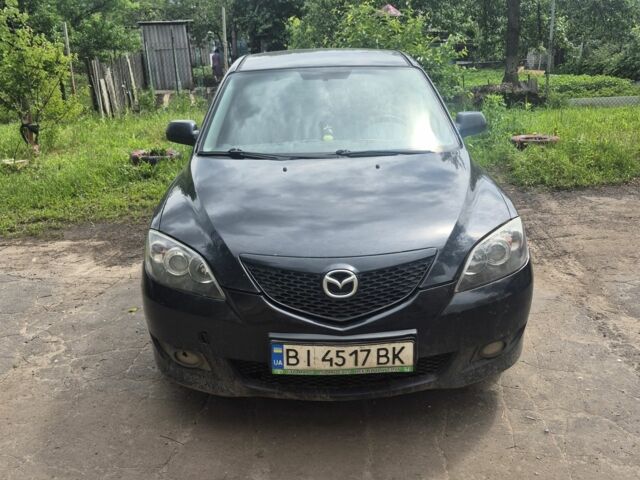 Черный Мазда 3, объемом двигателя 1.6 л и пробегом 300 тыс. км за 2700 $, фото 1 на Automoto.ua