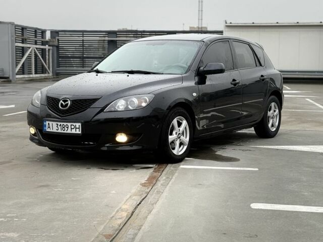 Черный Мазда 3, объемом двигателя 1.6 л и пробегом 300 тыс. км за 4000 $, фото 1 на Automoto.ua