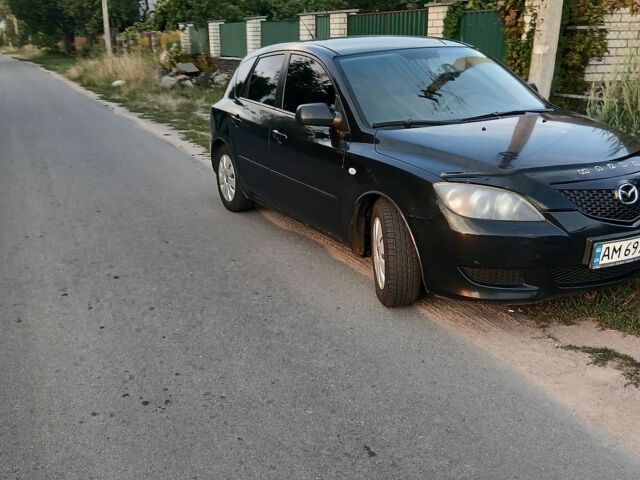 Черный Мазда 3, объемом двигателя 1.35 л и пробегом 285 тыс. км за 4500 $, фото 1 на Automoto.ua
